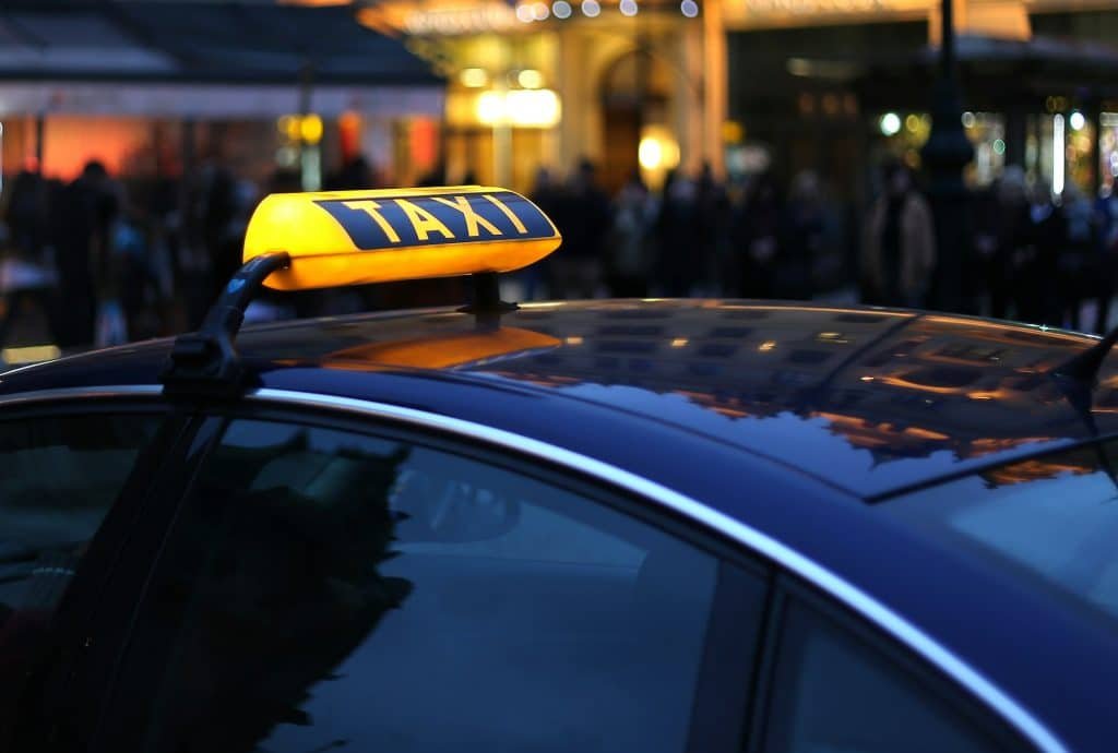 Taxi sign at night